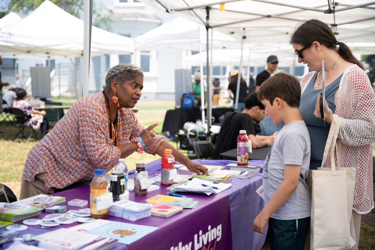 Person receiving information at Block Party booth