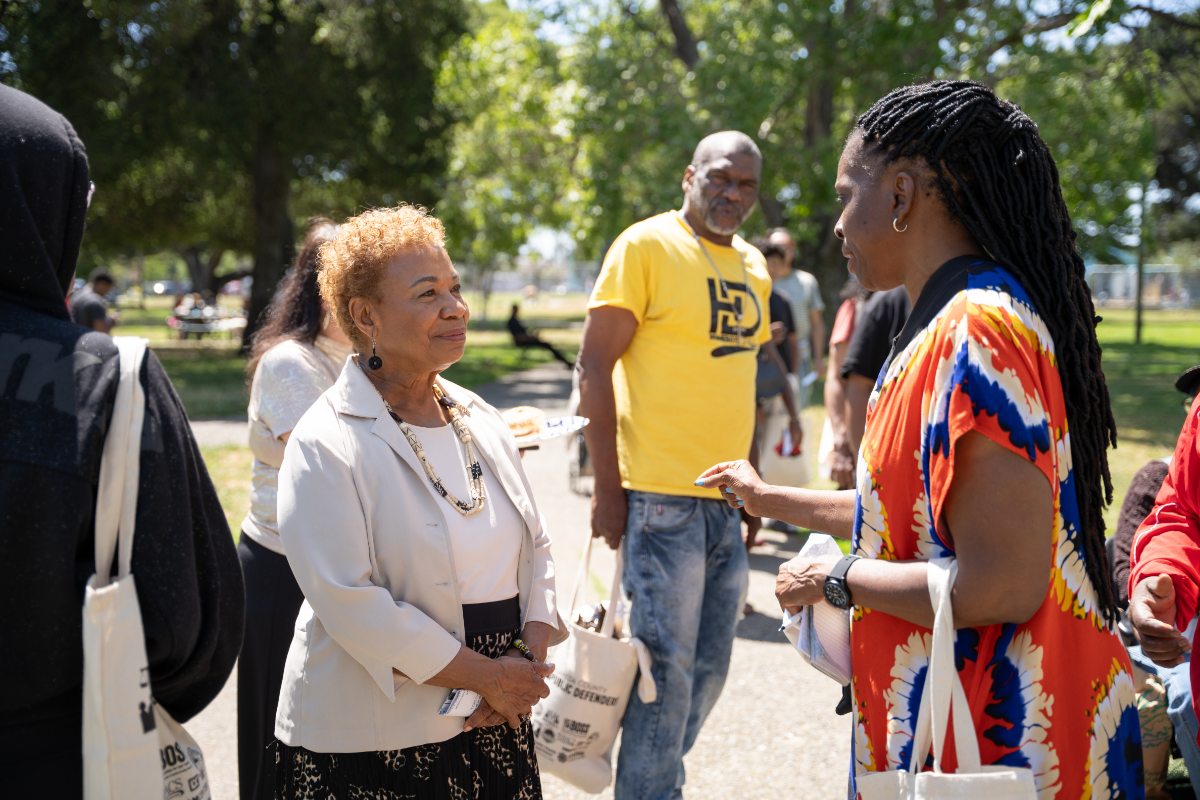 Mayor Barbara Lee Talking to Community Member